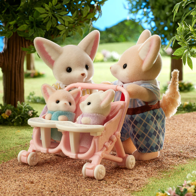 Fennec Fox Family figures with removable clothes in a garden scene, including parents and babies in a stroller.