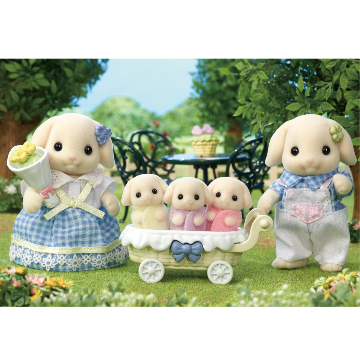 Flora Rabbit Family with father, mother, and three babies in blue checkered outfits with flower accessories outdoors.