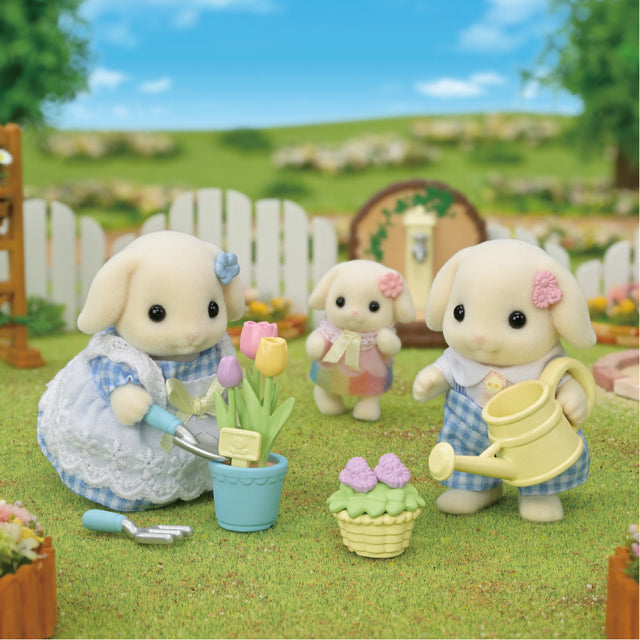 Blossom Gardening Set with Flora Rabbit siblings gardening tulips and flowers in a vibrant outdoor scene.