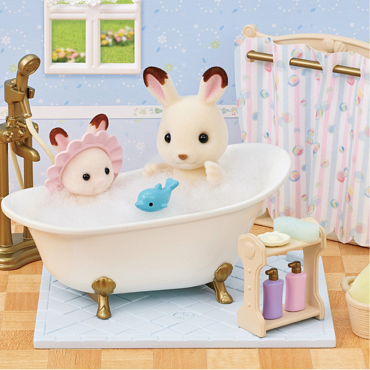 Bath & Shower Set with antique-style tub, two animal figures, bath toy, shampoo, and soap on tile floor.