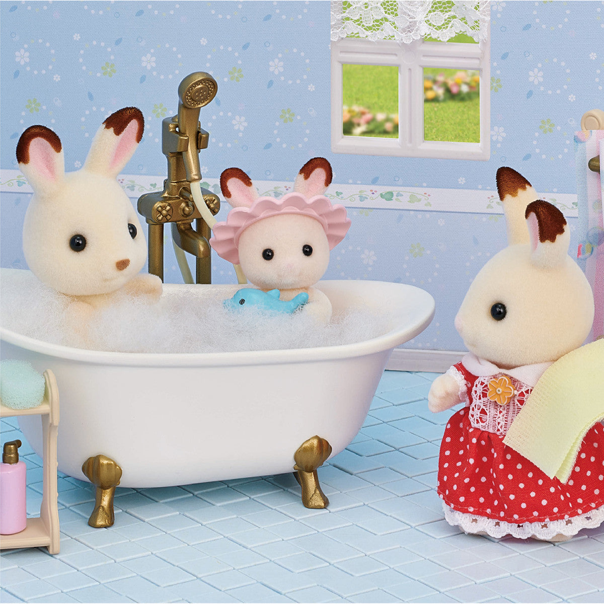 Bath & Shower Set with antique-style fittings, bunny toys in tub, shampoo, soap, and bath accessories on tile floor.