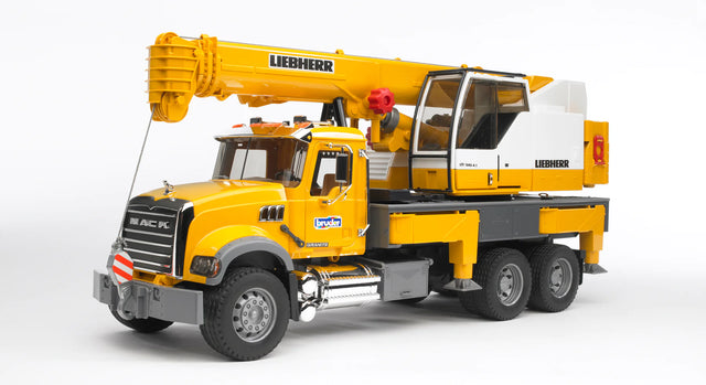 MACK Granite Liebherr Crane Truck model with extendable boom, detailed cab, and stabilizer legs in yellow and black design.