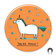 You're Magic Magnet featuring a whimsical unicorn on orange with blue stars, eco-friendly and charming design.