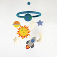 Felt Mobile | Planets & Space with colorful felt Earth, Sun, rocket, stars, and moon hanging from blue hoop.