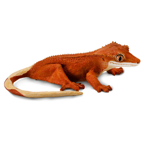 Crested Gecko toy figurine in orange and cream, detailed with scales, spikes, and realistic eyes, life-size at 5 1/2 inches.