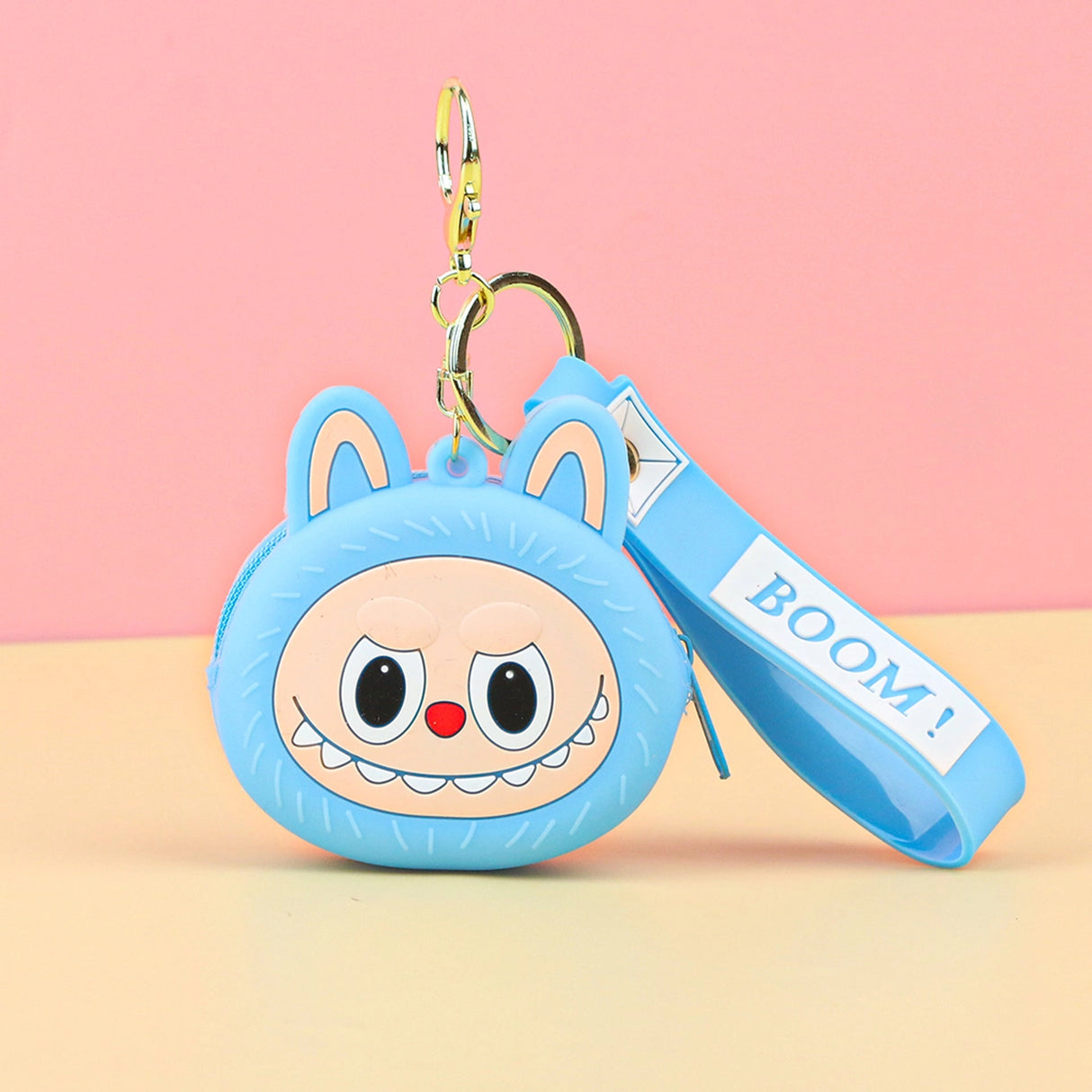 Labubu Head Coin Purse in blue with a cheerful face and keyring attachment for easy carrying and safe coin storage.