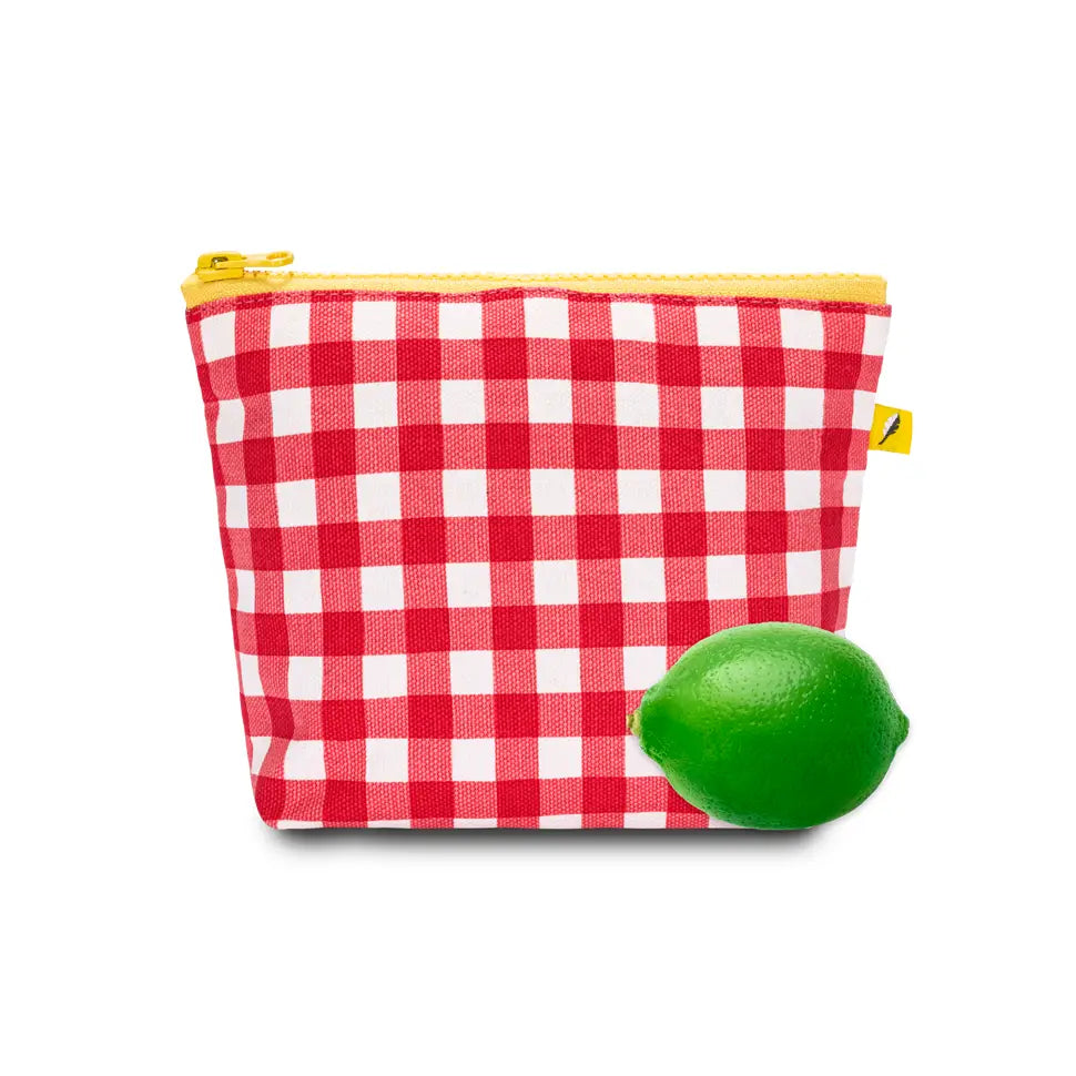 Small red gingham pouch with yellow zipper, made of organic cotton, perfect for carrying keys and earbuds.