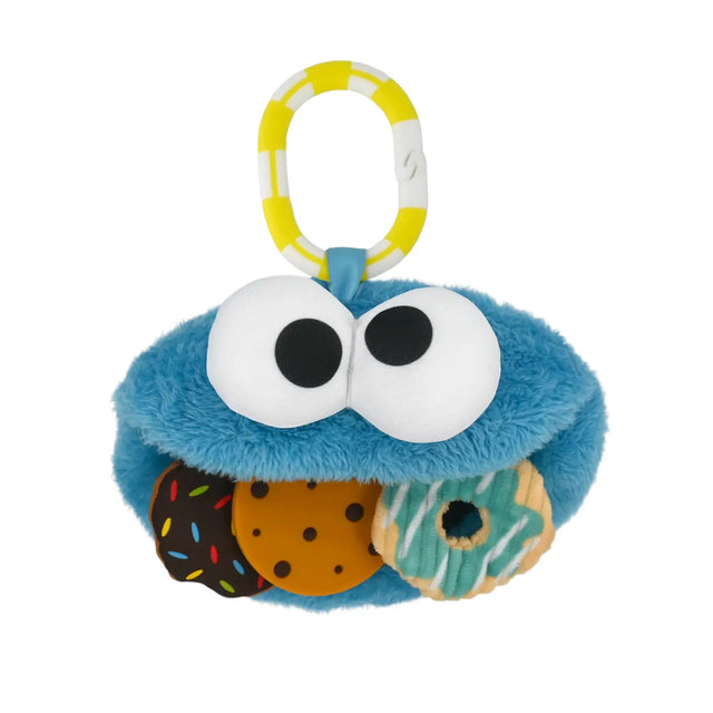 Sesame Street Cookie Monster On the Go plush toy with teether, clip, squeaky cookie, and crinkle donut for babies.