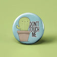 Button | Don't Touch Me Cactus featuring a cute cactus in a pot with "Don't Touch Me" text, 1.25 inches in size.