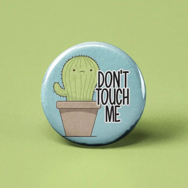 Button | Don't Touch Me Cactus featuring a cute cactus in a pot with "Don't Touch Me" text, 1.25 inches in size.