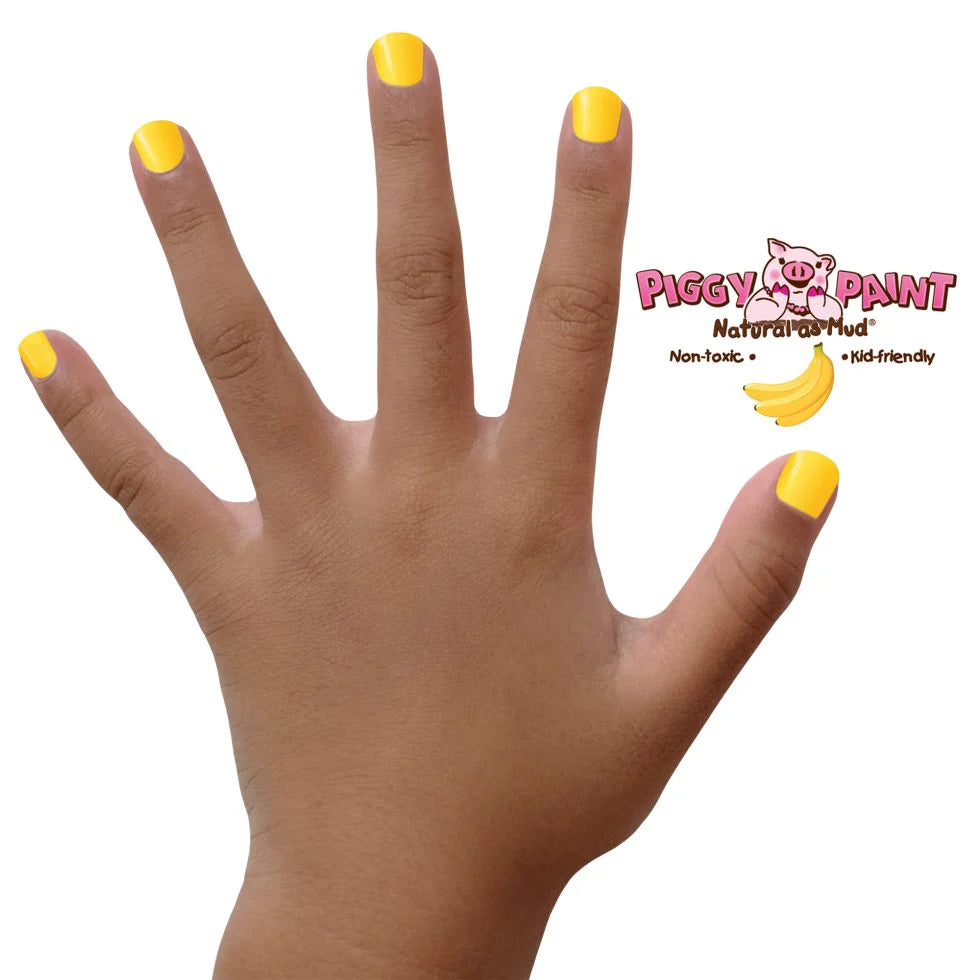 Hand with nails painted bright sunshine yellow using Nail Polish Scented Banana Besties by Piggy Paint.
