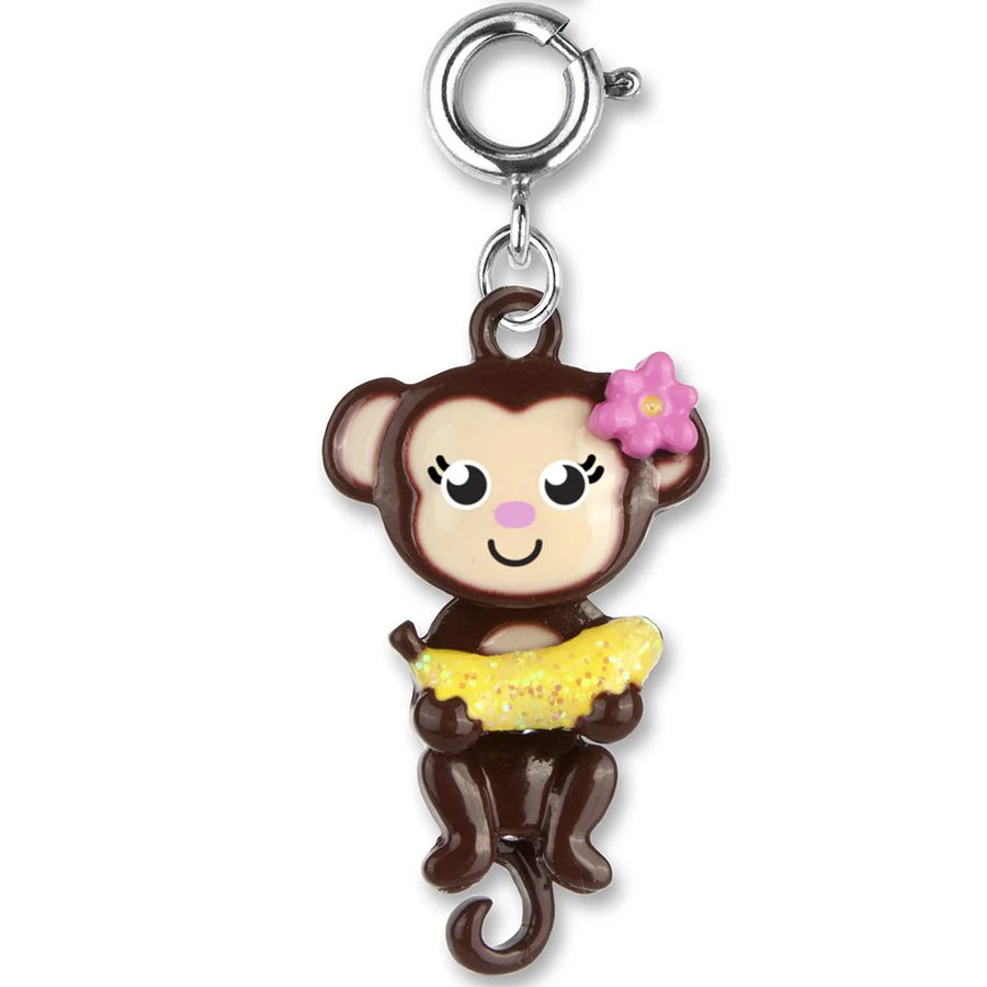 Swivel Monkey Charm featuring a cute enamel monkey holding a glittery banana with a pink flower accessory.