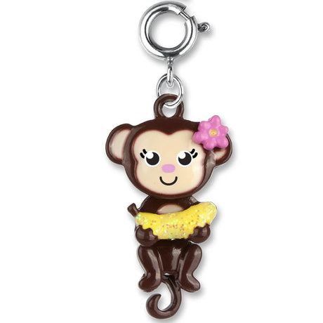Swivel Monkey Charm featuring a cute enamel monkey holding a glittery banana with a pink flower accessory.
