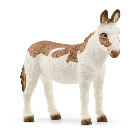 American Spotted Donkey toy with brown spots and light coat, lifelike details, and attentive ears on a white background.