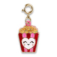 Gold Glitter Popcorn Charm featuring glittery popcorn and a smiling heart on a red and pink striped base.