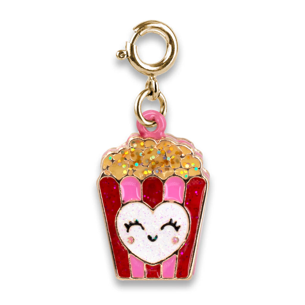Gold Glitter Popcorn Charm featuring glittery popcorn and a smiling heart on a red and pink striped base.
