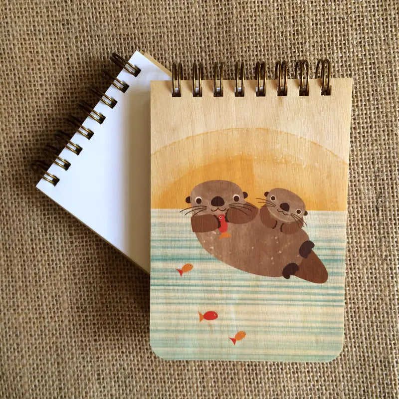 Mini Wood Notebook | Otters with spiral binding, featuring cute otter design on birch wood cover, eco-friendly and small size.