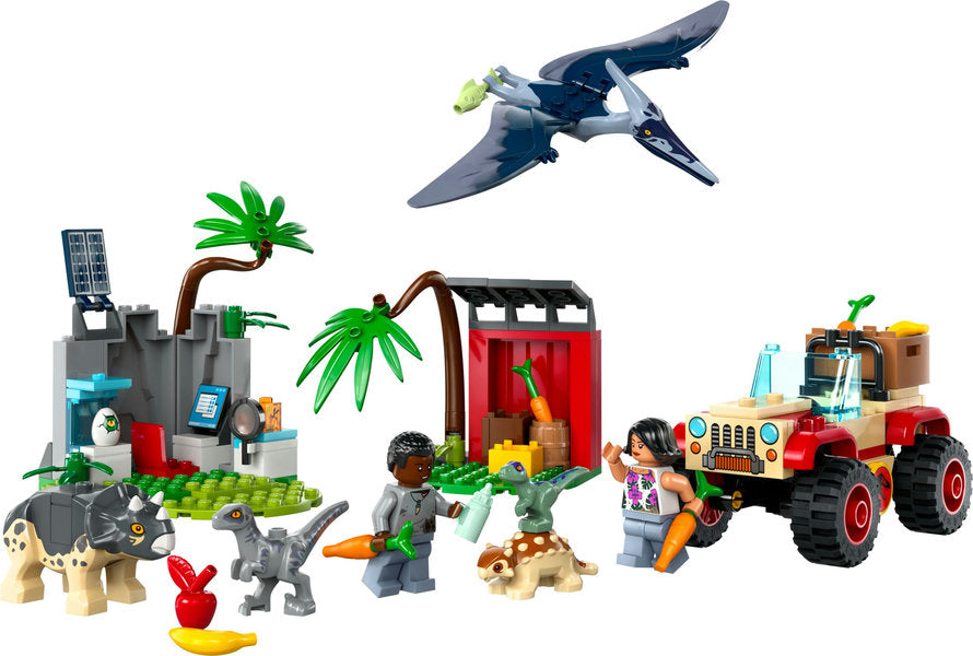 Jurassic World Baby Dinosaur Rescue Center with vehicle, cave, feeding station, two minifigures, and dinosaur figures.