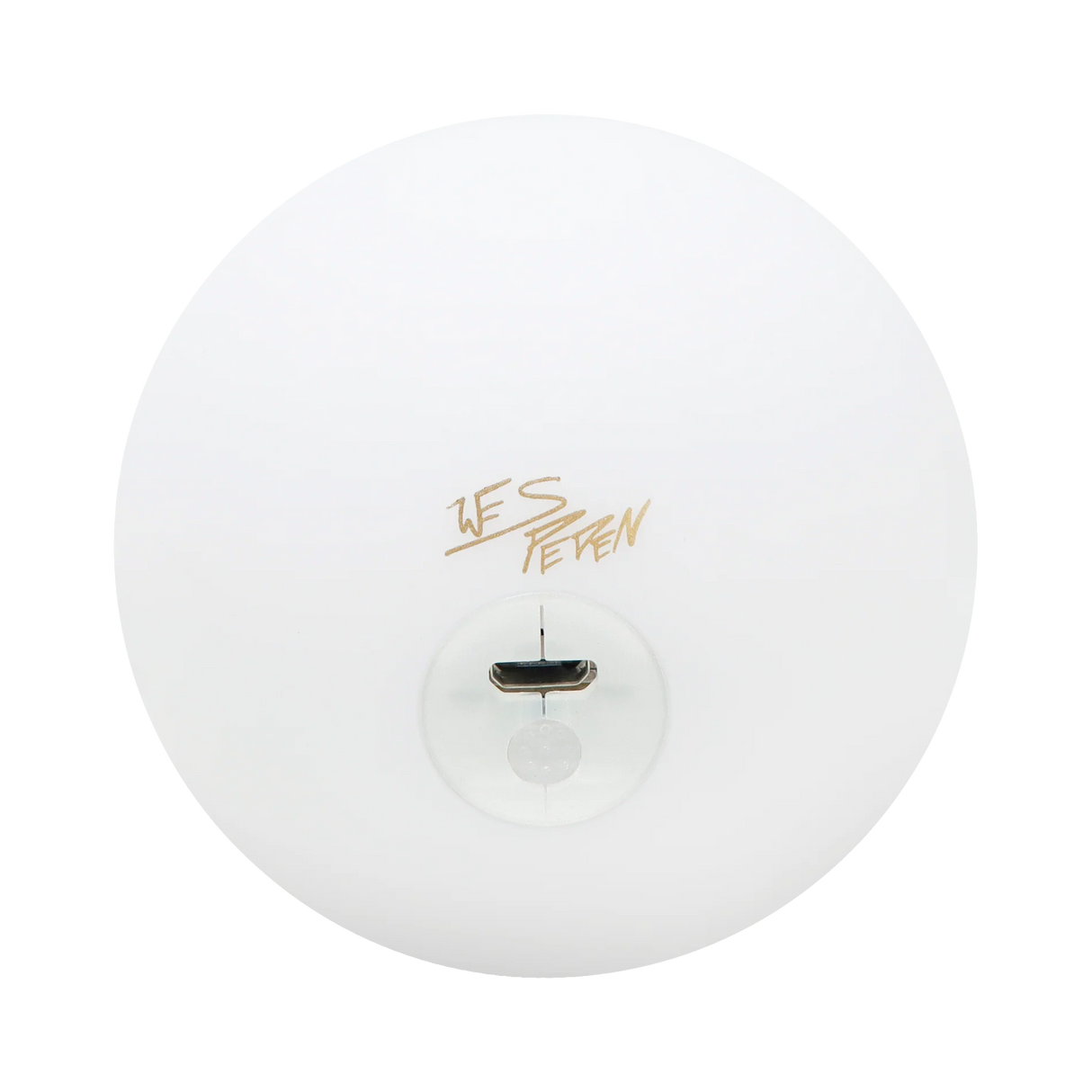 Top view of a white Glow.0 LED Juggling Ball by Wes Peden featuring charging port and logo.