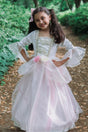 Golden Rose Princess Dress with soft pink skirt, floral waistband, and elegant sheer sleeves on smiling girl outdoors.