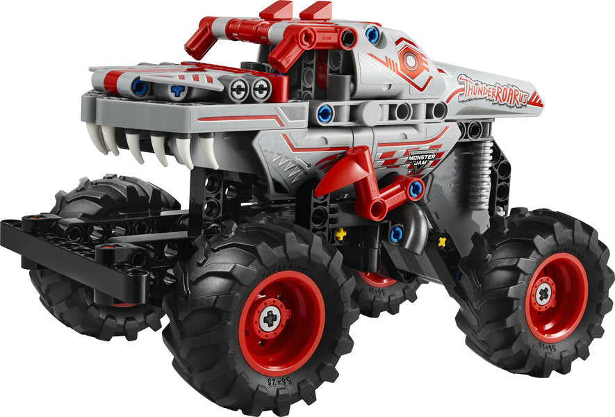 Technic Monster Jam ThunderROARus Pull-Back toy truck with dinosaur design, large wheels, and detailed spikes and teeth features.