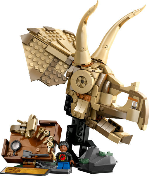 Jurassic World Dinosaur Fossils Triceratops Skull LEGO set with skull model, minifigure, fossils, and excavation tools display.