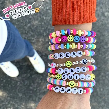 Don't Worry Bead Happy Bracelet featuring colorful beads with positive words and smiley faces on a wrist.