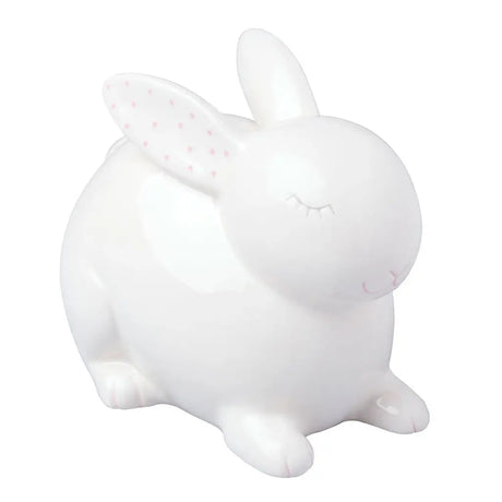 Ceramic Bunny Money Bank in white with pink polka dots inside ears, perfect for saving coins and bills.