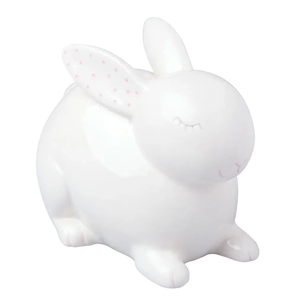 Ceramic Bunny Money Bank in white with pink polka dots inside ears, perfect for saving coins and bills.