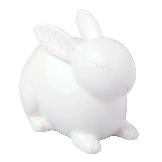 Ceramic Bunny Money Bank in white with pink polka dots inside ears, perfect for saving coins and bills.