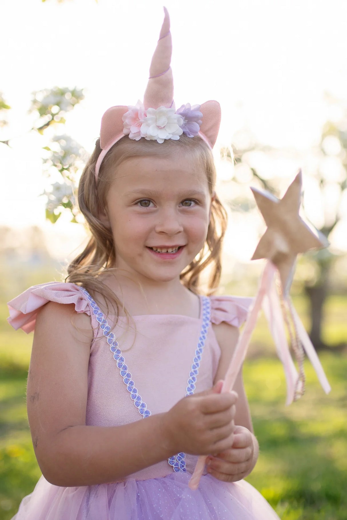 Pink Shimmer Unicorn Dress & Headband size 5-6 with ruffled sleeves, tulle skirt, and floral unicorn headband.