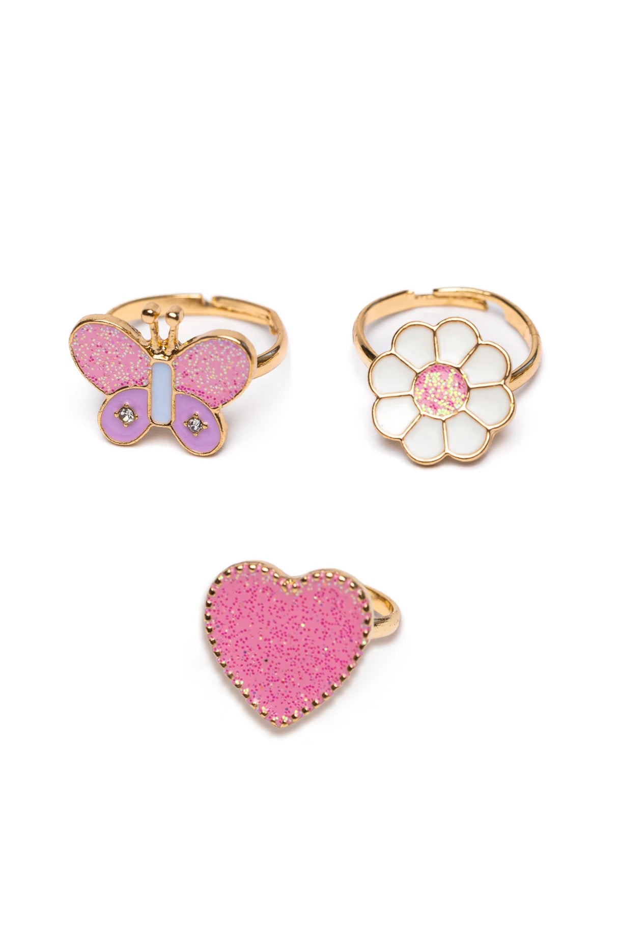 Wonderland Ring Set featuring pink glitter heart, white flower, and pink butterfly adjustable rings on gold bands.
