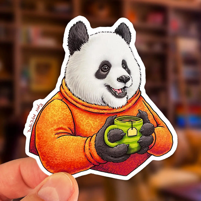 Cup of Tea Panda Sticker showing a cheerful panda in an orange sweater holding a green tea cup, waterproof and durable.