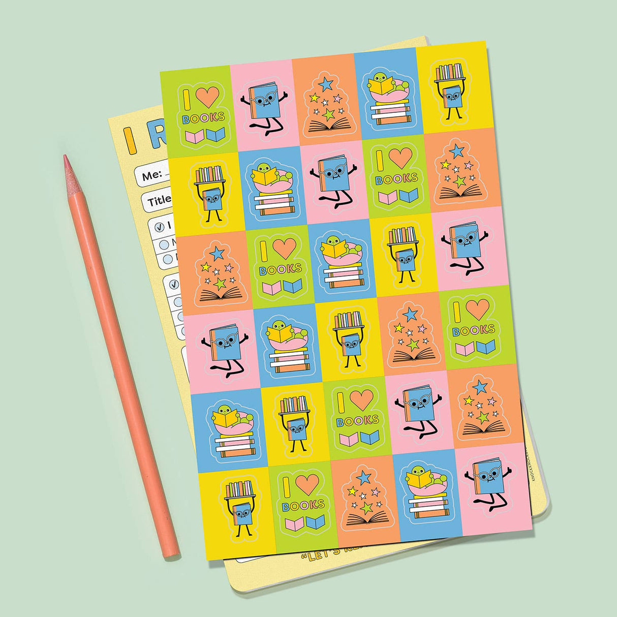 Colorful sticker sheet with book and reading-themed characters on top of a playful guided reading reflection pad