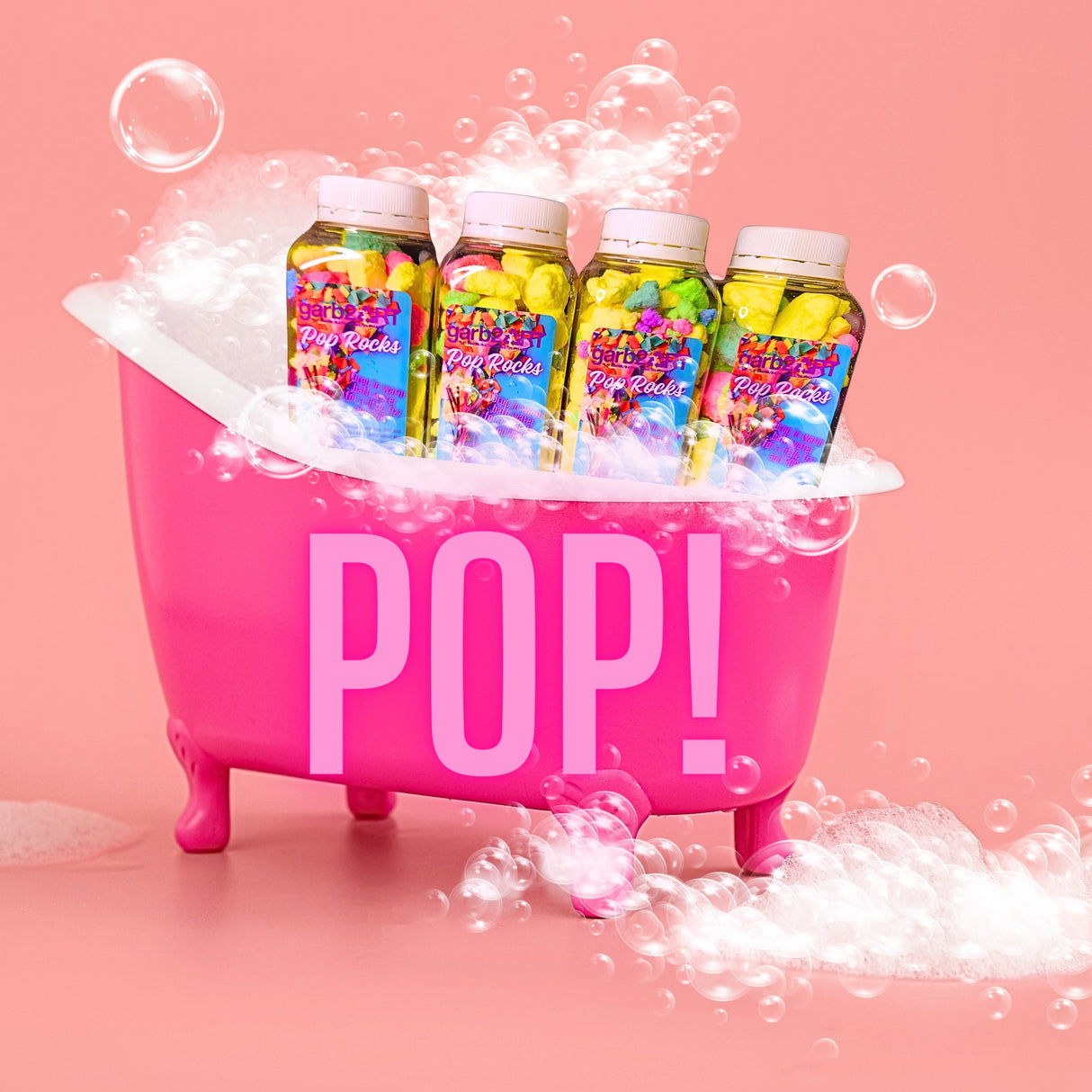 Pop Rocks Bath Fizzies in colorful jars placed in a pink bubbly bathtub with foam and bubbles.