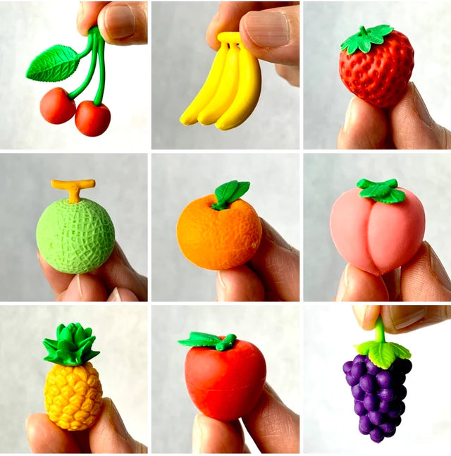 Japanese Eraser Fruit showing detailed, colorful miniature fruit erasers held between fingers, perfect for puzzles and decorations.