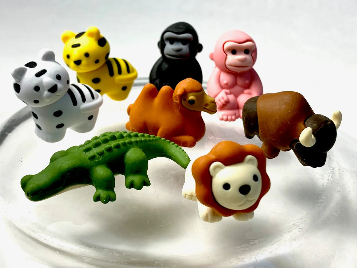 Japanese Eraser Safari featuring colorful animal erasers like lion, camel, gorilla, crocodile, and bison puzzle pieces.