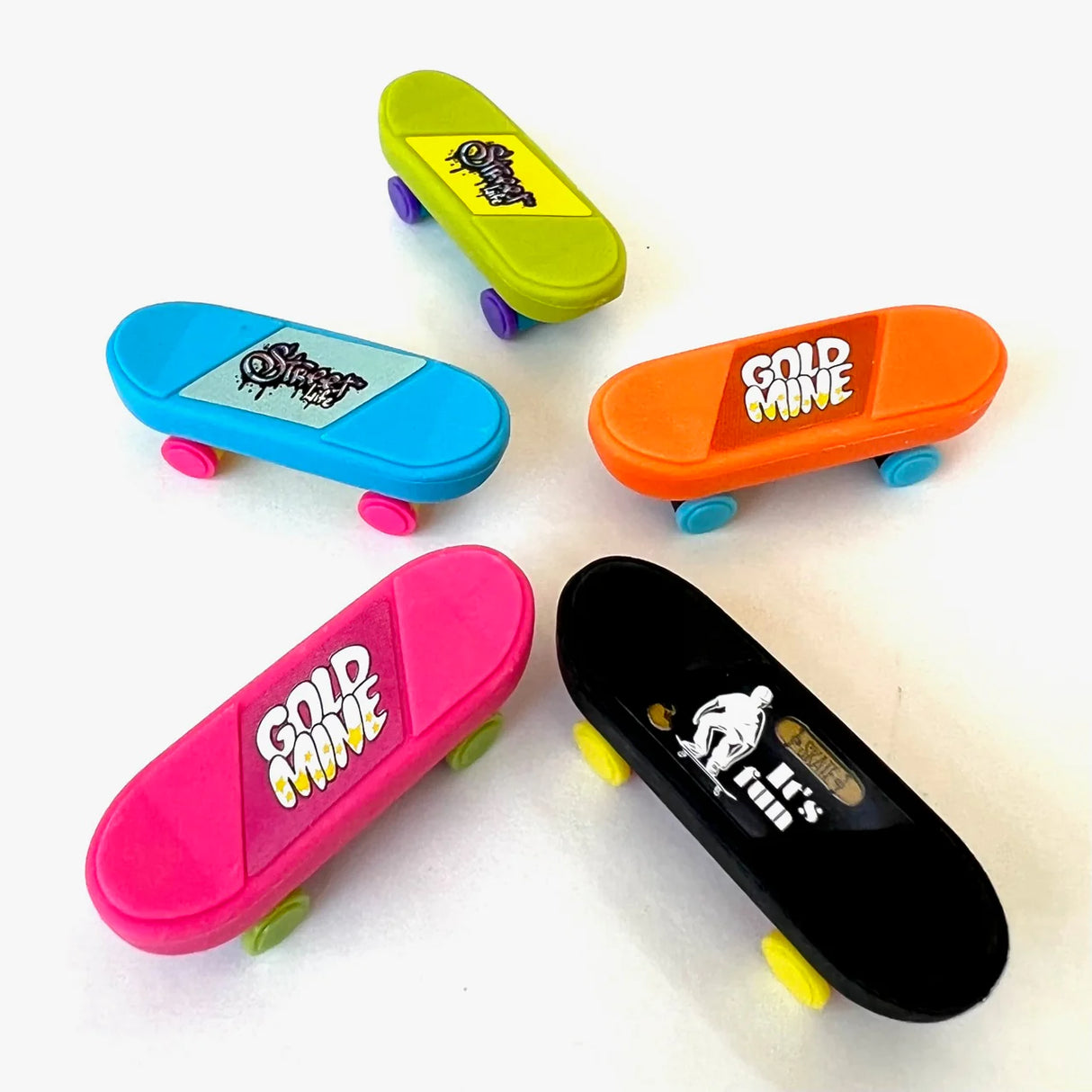 Japanese Eraser Skateboard in assorted colors with rolling wheels, handcrafted eco-friendly puzzle eraser toy from Japan.