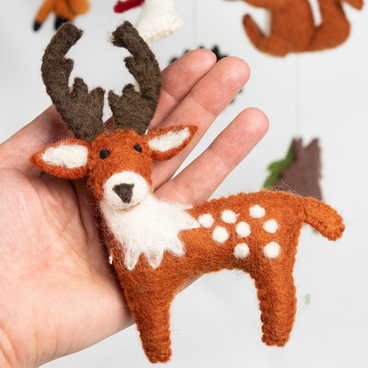 Felt Mobile | Forest Creatures handmade felt deer with natural wool, part of a colorful nursery mobile for baby decor.
