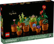 Botanicals Tiny Plants LEGO set with nine buildable floral models in terracotta pots for elegant home decor.