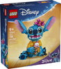 Disney Classic Stitch LEGO buildable toy with movable ears, Hawaiian shirt, ice cream cone, and flower accessory, 730 pieces set.