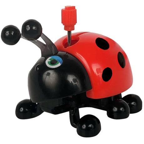 Z Wind Ups | Ladybug Lori red and black windup toy with moving arms and head for kids ages 3 and up.