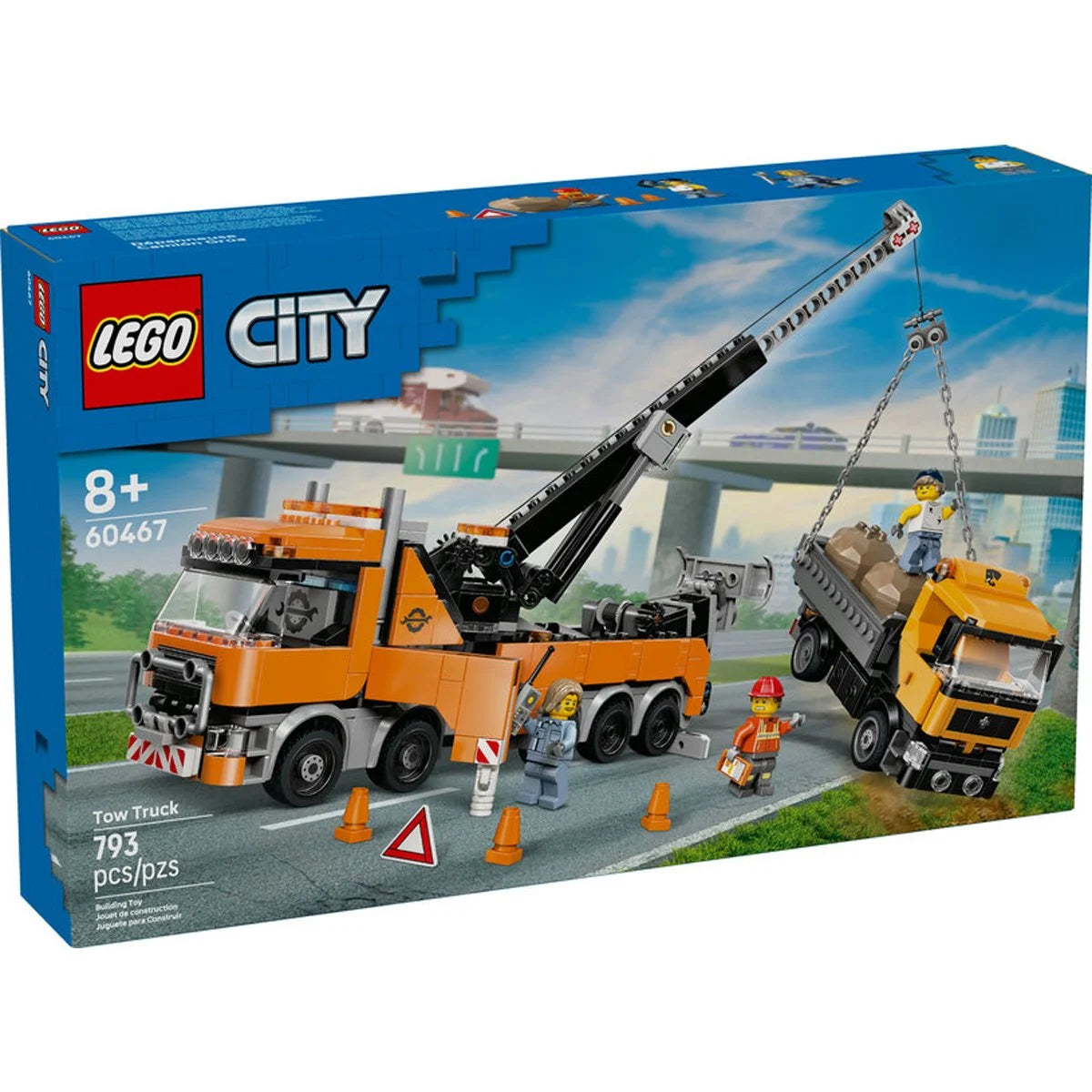Boxed LEGO City Heavy-Duty Recovery Tow Truck toy set with crane, dump truck, minifigures, and road safety accessories.