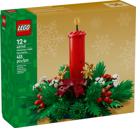 LEGO Christmas table decoration featuring a red candle, green foliage, red berries, golden stars, and white flowers