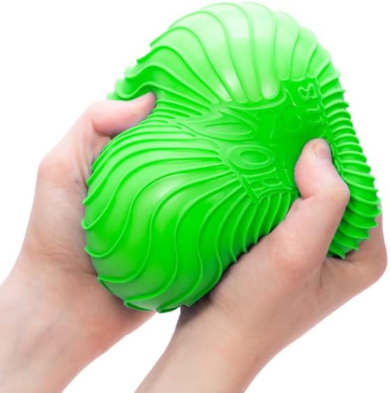 Hands squeezing a bright green squishy toy showing texture and flexibility of NeeDoh Super Ripples stress ball.