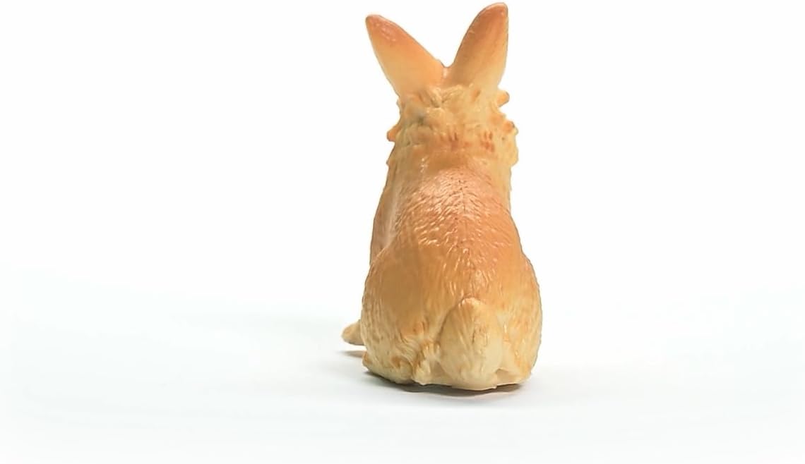 Lionhead Rabbit toy shown from behind with orange fur and fluffy mane sitting on white background.