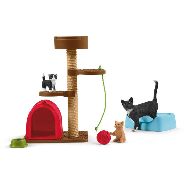 Playtime for Cute Cats with three cats, adjustable scratching post, red house, basket, bowl, ball of wool, and string.