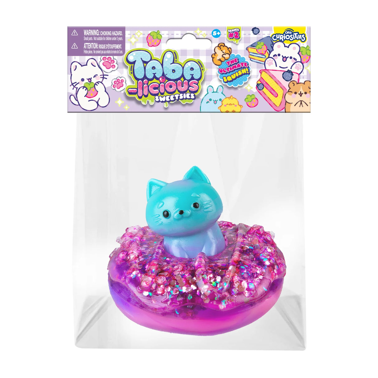 Taba-licious Sweetsies Squishy featuring a blue cat on a sparkly purple frosted donut squishy toy.