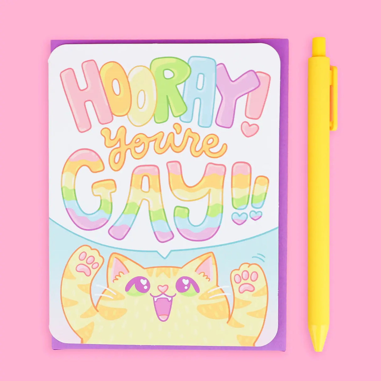 Hooray You're Gay! Card featuring a cheerful cat with rainbow text celebrating Pride Month by Turtle's Soup.