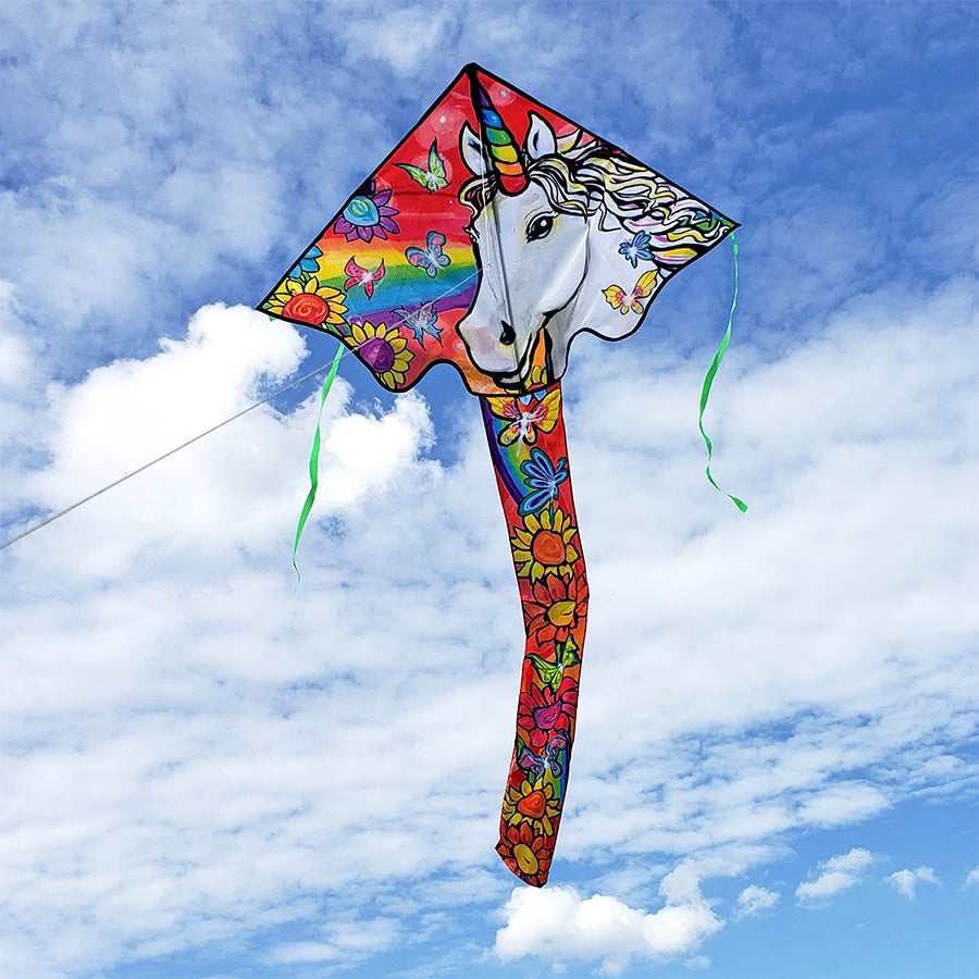 46" Easy-Flyer Flower Unicorn Kite soaring against a blue sky with vibrant colors and floral patterns.